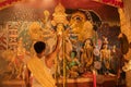 Priest worshipping Goddess Durga, Durga Puja festival celebration