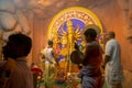 Priest worshipping Goddess Durga, Durga Puja festival celebration