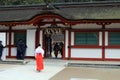 A priestess Miko around Dazaifu Tenmangu, Fukuoka, Japan