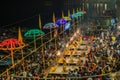 PRIESTS DURING A CEREMONY IN VARANASI, INDIA