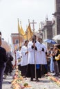 Priests and members of the Catholic church perform a procession Royalty Free Stock Photo