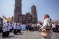 Priests and members of the Catholic church perform a procession Royalty Free Stock Photo