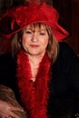 Prim Red Hat Lady Royalty Free Stock Photo