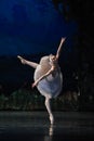 Prima Ballerina Staring at the Reflection in Water