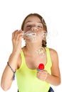 Primary Aged Girl Blowing Bubbles