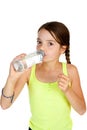 Primary Aged Girl Drinking Mineral Water