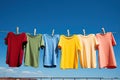 Primary Colored T-Shirts on a clothesline Royalty Free Stock Photo