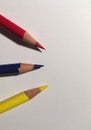 Primary colors pencils oon white paper Royalty Free Stock Photo