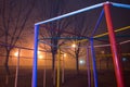 Primary Colours on a foggy night in a school playground, Poltava, Ukraine.