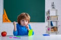 Primary school pupil. Little child at school lesson. Kids gets ready for school.