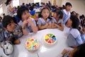 Primary school students organize birthday parties in the school canteen.