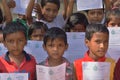 Primary students shows their greetings letters which were sent by the Chief minister of West Bengal to them