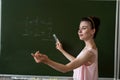 primary teacher written on chalkboard one add one Royalty Free Stock Photo