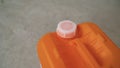 For priming plastered surfaces. Orange canister with primer