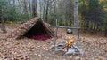 Primitive Bushcraft A frame Survival Shelter in the Blue Ridge Mountains near Asheville, North Carolina. Autumn camp setup i Royalty Free Stock Photo