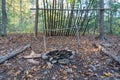 Primitive lean to Shelter with campfire  Survival Bushcraft setup in the Blue Ridge Mountains near Asheville. During Royalty Free Stock Photo