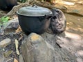 Traditional primitive Philippine style ground cooking using rocks and stones as stove