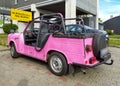 Old small pink plastic East German compact convertible car Trabant 601 1.1 in July, 2022