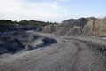 Primitive road for quarry trucks through quarrying territory.