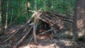 Primitive Spring A frame Survival Shelter in the Blue Ridge Mountains near Asheville, North Carolina. Bushcraft camp setup in the Royalty Free Stock Photo