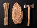 primitive tools and materials on black background Royalty Free Stock Photo