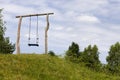 primitive wooden swing