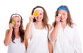 Primping girls having fun with fruit slices Royalty Free Stock Photo