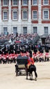 Prince Charles riding behind the Royal Carriage