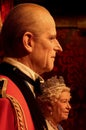 Prince philip and queen elizabeth II wax statues at madame tussauds in hong kong Royalty Free Stock Photo