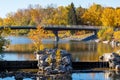 Princes Island Park autumn foliage scenery. Jaipur Bridge ( Bow River Pathway Bridge ), Downtown Calgary