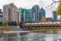 Princes Island Park Peace bridge. Autumn foliage scenery in downtown Calgary Bow river bank