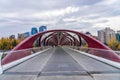 Princes Island Park Peace bridge. Autumn foliage scenery in downtown Calgary Bow river bank Royalty Free Stock Photo