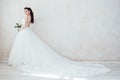 Princess Bride in a wedding dress standing in a room of vintage Royalty Free Stock Photo