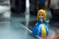 Princess figures in yellow blue dress in toy concept