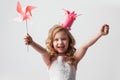 Princess girl with pinwheel Royalty Free Stock Photo