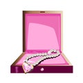 Jewelry box with a pearl necklace and pink gemstones