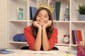 Princess school girl. Portrait of dreaming teenage girl with crown, feeling princess. Child princess crown on Royalty Free Stock Photo