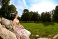 Princess in an vintage dress in nature Royalty Free Stock Photo