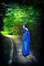 Princess walk through darkest forest Royalty Free Stock Photo