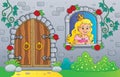 Princess in window and old door Royalty Free Stock Photo