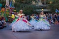 Princesses in Disney parade families watching