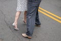 Legs and feet of male and female couple demonstrating dance moves on the street Royalty Free Stock Photo