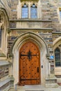 PRINCETON, USA - NOVENBER 12, 2019: a view of Foulke Hall at Princeton University. Wooden door and elements of architecture,