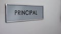 Principal office door desk closeup, visit to school director, education system