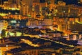 Principality Monaco at night. Scenic landscape view of luxury multi-story residential buildings near the port