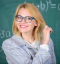 Principles can make teaching more effective and more efficient. Woman teaching near chalkboard. Effective teaching