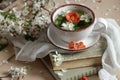 Pring floral herbal mint tea with flower buds of apple tree and quince flowers , vintage retro composition