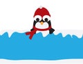 Cute Penguin with Red Beanie and scarf behind a Blue sign with snow Royalty Free Stock Photo