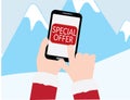Hand with red sleeves holding smartphone with SPECIAL OFFER text on Blue mountains with snow background