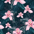 Seamless pattern with flowers Orchid, colorful tropical leaves and herbs. Royalty Free Stock Photo